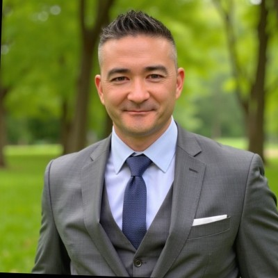 Mitch Mihalko in a gray suit outdoors